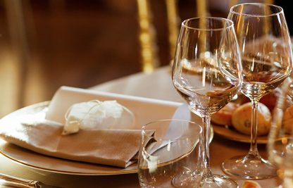 Attendees enjoying a splendid evening at the gala dinner, filled with laughter, fine dining, and elegant ambiance.